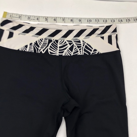 Lululemon Inspire Crop 
Black / Pretty Palm Black Angel Wing - Picture 5 of 8